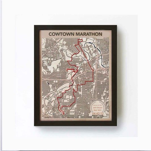 Framed map of the Cowtown Marathon with a red route highlighted.